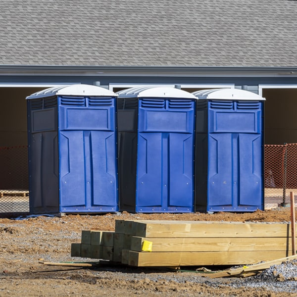 how often are the portable restrooms cleaned and serviced during a rental period in West Goshen